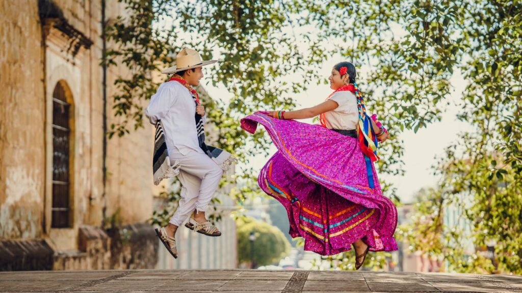 Couple-of-Dancers-in-Traditional-Costumes-in-Jump
