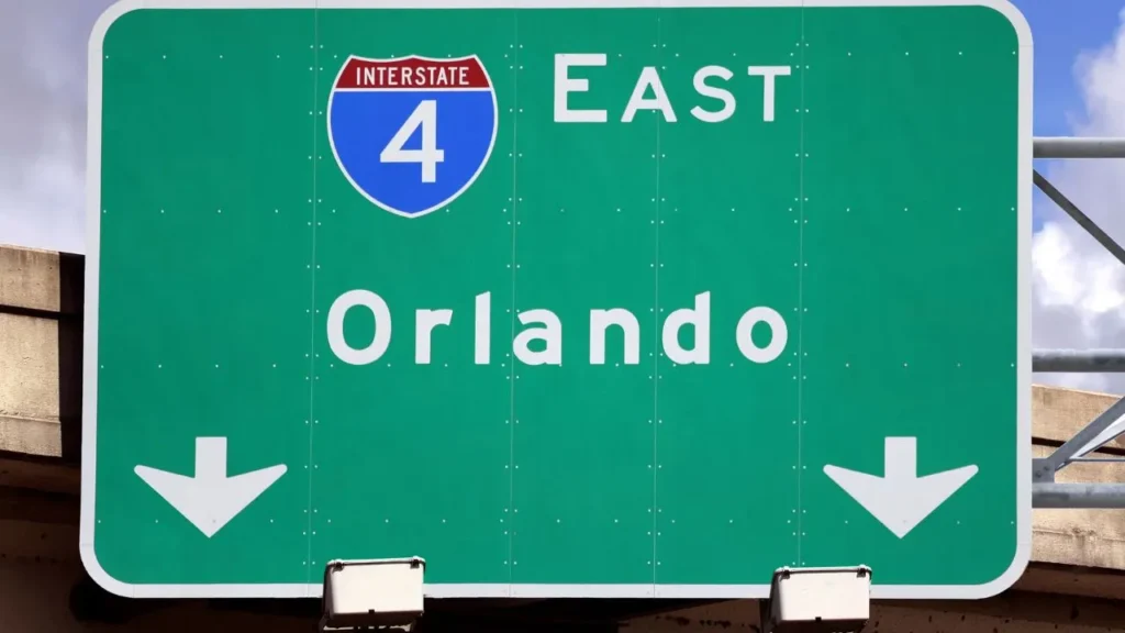 Green Interstate 4 East highway sign pointing toward Orlando, Florida