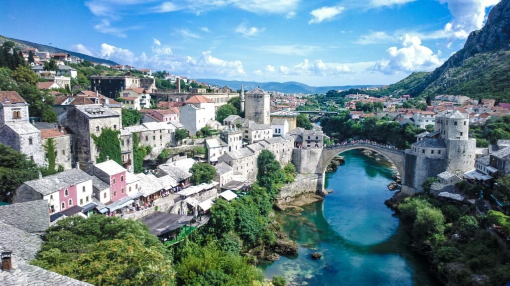 Stari Most Old Bridge in Mostar Bosnia and Herzegovina, aerial view of the historic Ottoman stone arch bridge over the Neretva River
